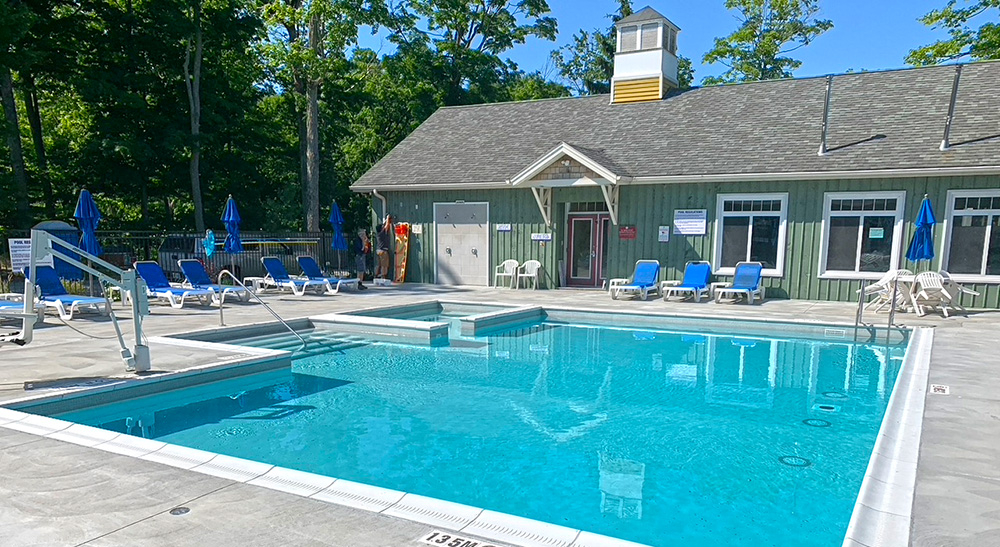 Sandbank Summer Village's outdoor leisure pool with an accessibility lift